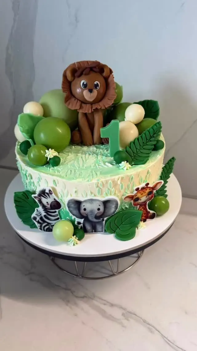 Safari kūka ar lauvu, zebru, zilonīti un žirafi, skaitlis 1